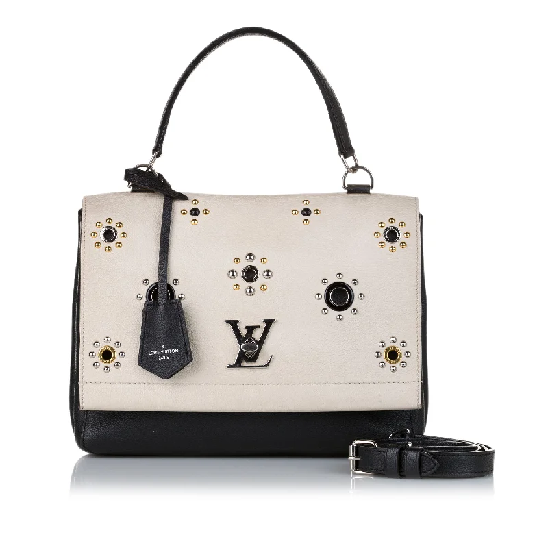 Ladies Louis Vuitton Petite Malle bags with a star - shaped charm for cutenessLouis Vuitton Mechanical Flowers LockMe II Studded Bicolor Leather