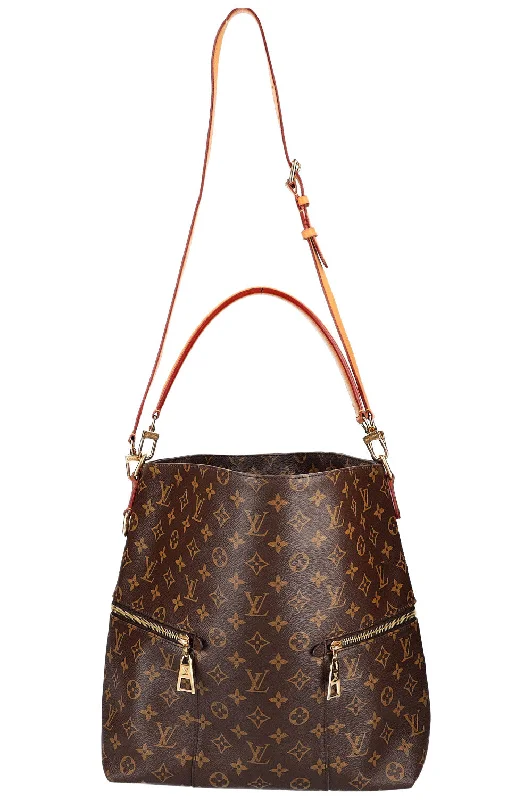 Louis Vuitton crossbody bags in a bold red color for a statementLOUIS VUITTON Melie Bag MNG