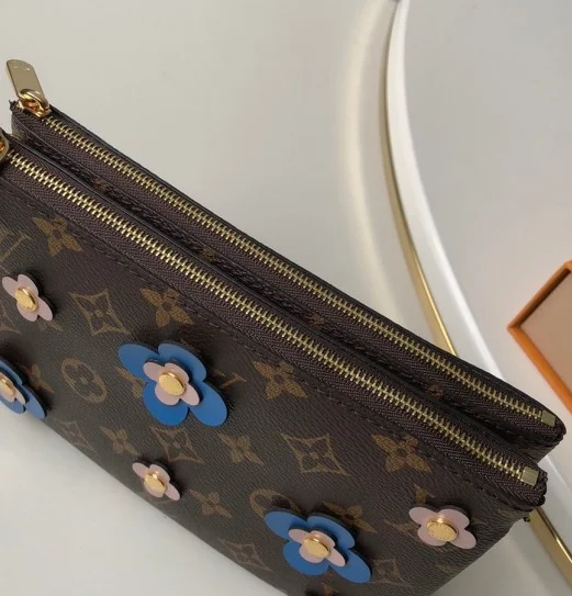 Louis Vuitton Petite Malle bags with a hard - shell structure for uniquenessLouis Vuitton Pochette Double Zip Monogram Canvas Blue Blooming Flowers