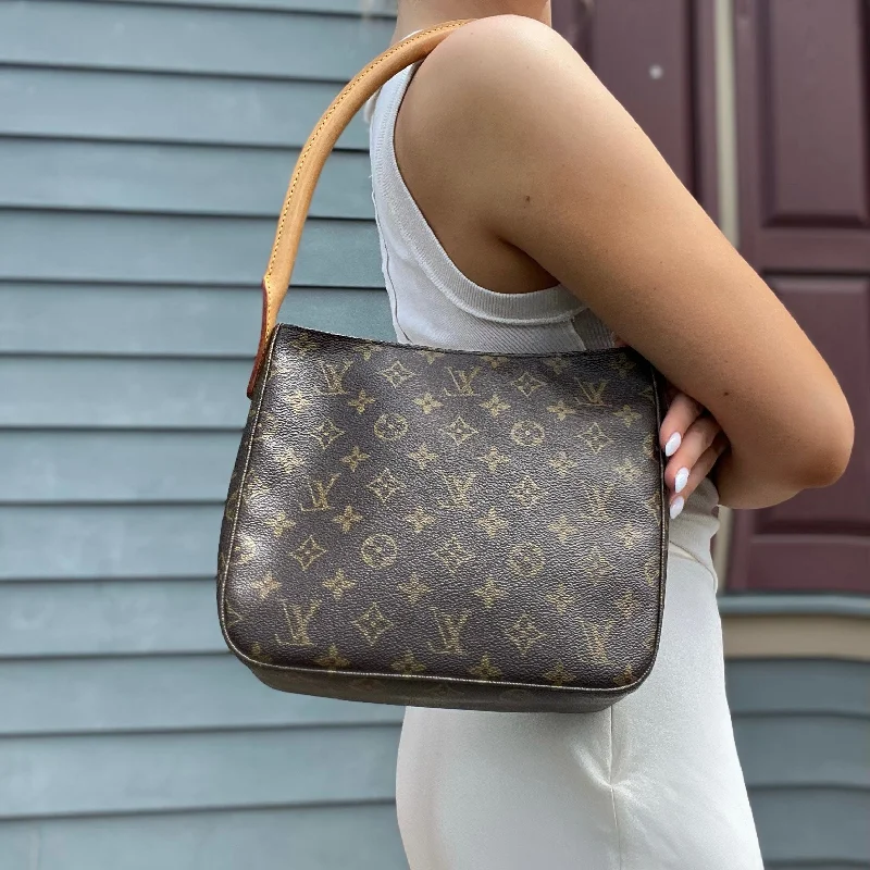 Louis Vuitton Twist bags with a contrast - colored interior for visual interestLouis Vuitton Monogram Looping MM Bag