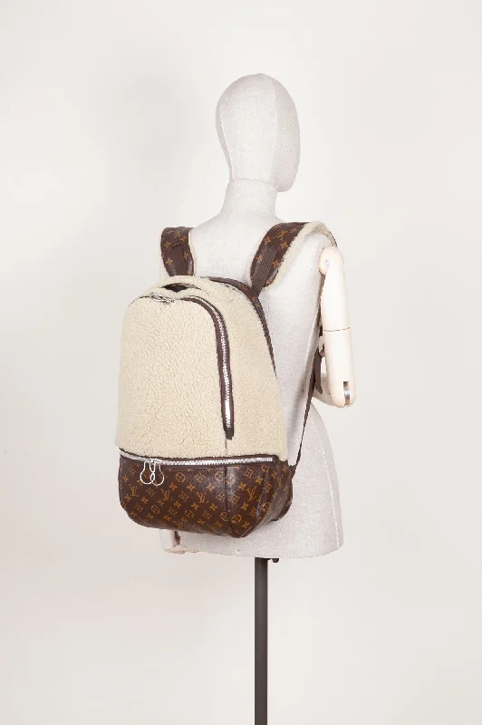 Louis Vuitton crossbody bags with a woven leather strap for textureLOUIS VUITTON Marc Newson Backpack Shearling MNG