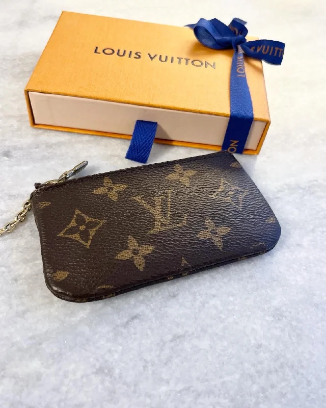 Louis Vuitton bags with a detachable mobile phone holder for convenienceLouis Vuitton Monogram Cles Chain Key Pouch