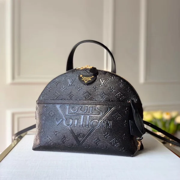 Ladies Louis Vuitton Petite Malle bags with a star - shaped charm for cutenessLouis Vuitton Moon Backpack Monogram Midnight Canvas Cruise 2020