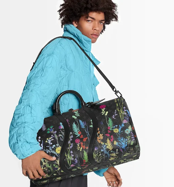 Louis Vuitton crossbody bags with a printed floral pattern for femininityLouis Vuitton Keepall Bandouliere 50 Monogram Eclipse Foliage