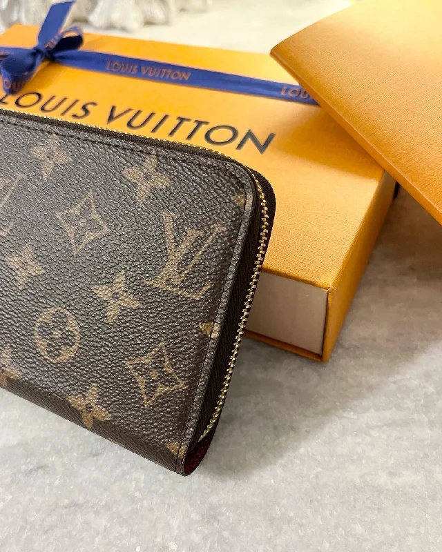 Louis Vuitton bags with a front - flap pocket for quick - access itemsLOUIS VUITTON Monogram Zippy Wallet in Fuchsia