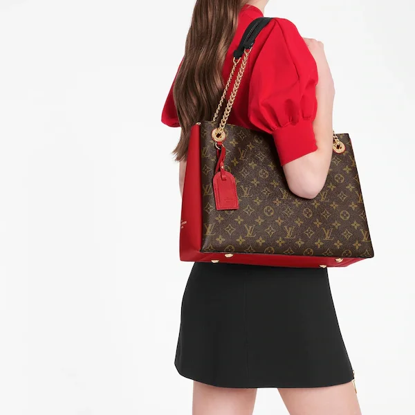 Louis Vuitton bags with a chain - link trim and a leather body for a modern edgeLouis Vuitton Surene MM Monogram Cherry