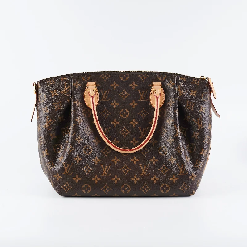 Louis Vuitton bags with a snap - button closure and a decorative charm for styleLouis Vuitton Turenne PM Monogram