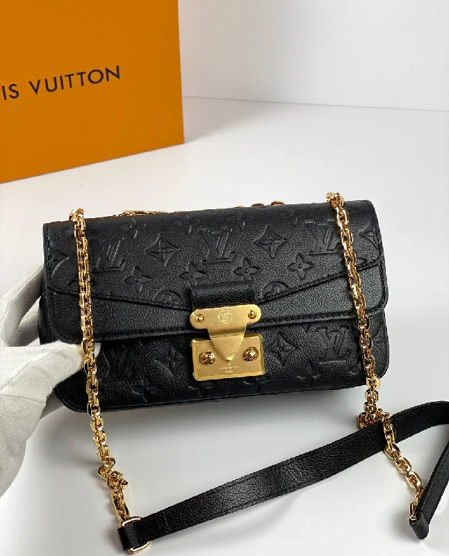 Louis Vuitton bags with a snap - button closure and a decorative charm for styleLouis Vuitton Marceau Bag black