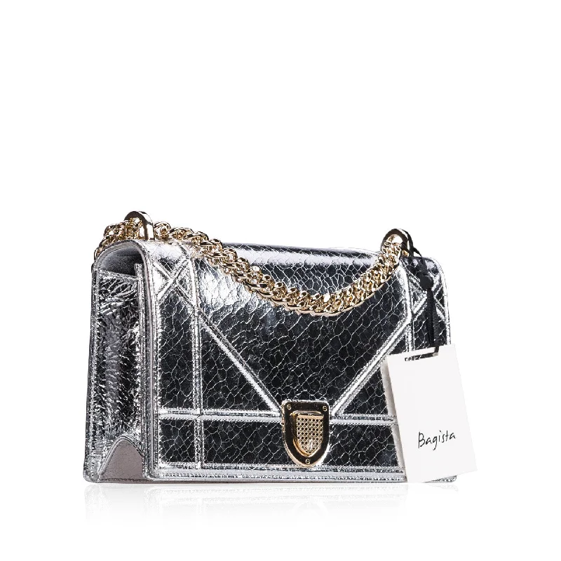 Christian Dior Saddle bags with a studded trim for a bold lookDiorama