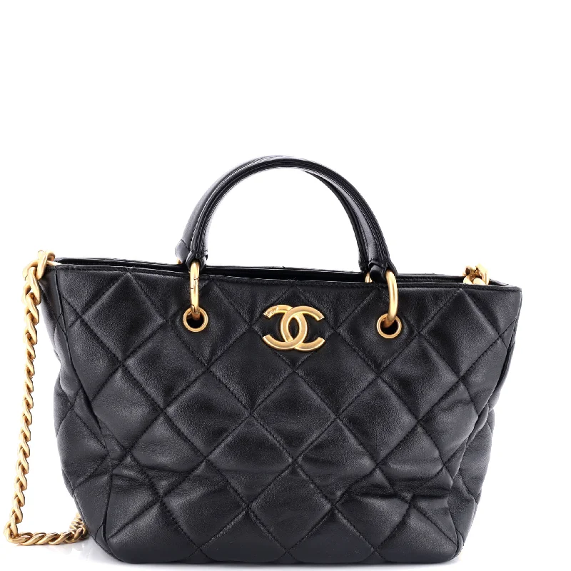 Christian Dior Saddle bags with a studded trim for a bold lookCC Top Handle Chain Shopping Tote Quilted Lambskin Small