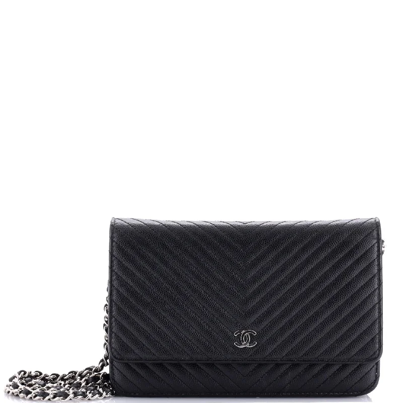 Christian Dior handbags with a snap - button closure and a decorative buckleWallet on Chain Chevron Caviar