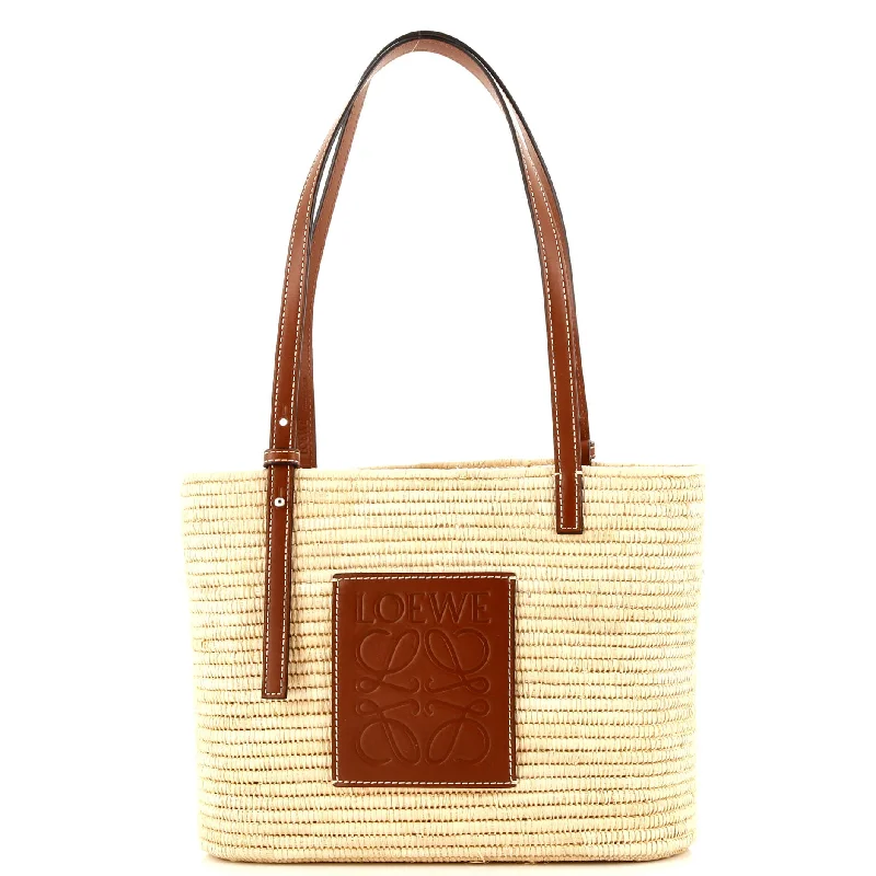 Christian Dior tote bags with a printed Dior logo on the frontSquare Basket Tote Woven Raffia Small